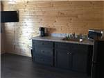 The kitchen area of a rental cabin - thumbnail