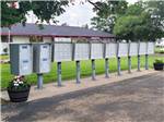 A row of mailboxes in front of office - thumbnail