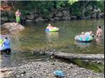 People floating on inner tubes - thumbnail