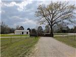 A road leading to a gate - thumbnail