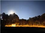 The cornhole area at night - thumbnail