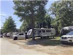 A row of gravel RV sites at MAXIE'S CAMPGROUND - thumbnail