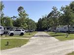 A road between RV sites at CAMPGROUNDS OF THE SOUTH - thumbnail