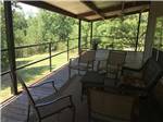 View larger image of Outdoor porch seating at CLOUD NINE RV PARK image #9