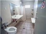 The bathroom and shower stall at DESERT ROSE RV PARK - thumbnail