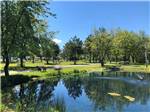 View larger image of RV sites by the pond at CAMPING MELBOURNE ESTRIE image #4