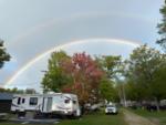 Parked trailer under a rainbow at Twin Ells Campsite - thumbnail