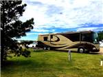 View larger image of A Class A Motorhome in an RV site at A PRAIRIE BREEZE RV PARK image #2