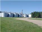 View larger image of Gravel road leading to silos at A PRAIRIE BREEZE RV PARK image #7