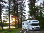 RV and chairs in a site at Indian Lake RV Resort - thumbnail