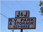 View larger image of Park sign with power lines running behind it at J  J RV PARK image #2