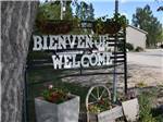 Welcome sign in English and French at ARROWHEAD RV PARK - thumbnail