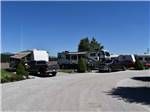 A gravel road in front of back in RV sites at WILD ROSE RV PARK - thumbnail