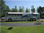View larger image of RV parked at campsite at AA ROYAL MOTEL  CAMPGROUND image #6