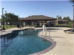 View larger image of The empty swimming pool area at A MOTEL  RV PARK image #5
