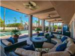 View larger image of Patio area with U shaped couch and mosaic table at ROYAL PALM RV RESORT image #4