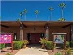 View larger image of Lodge office with summer signs at ROYAL PALM RV RESORT image #7