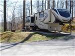 A fifth wheel trailer at RIFRAFTERS CAMPGROUND - thumbnail