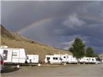 A rainbow over RV sites at YELLOWSTONE RV PARK - thumbnail