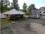 Tents and RVs parked at YELLOWSTONE RV PARK - thumbnail