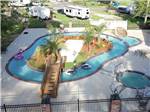 An aerial view of the lazy river in the daytime at TWELVE OAKS RV PARK - thumbnail