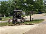 An old horse pulled buggy at TWELVE OAKS RV PARK - thumbnail
