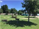 A group of grassy RV sites at COUNTY LINE RV PARK & CAMPGROUND - thumbnail