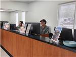 People at the reception desk - thumbnail