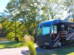 Class A parked at a paved site surrounded by grass at CATHERINE'S LANDING - thumbnail