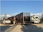 A large motorhome in a pull thru site at RIVER'S EDGE RV RESORT - thumbnail
