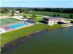 View larger image of Aerial view of water and pool at LEISURE LAKE RESORT image #3
