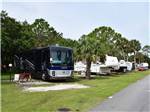 View larger image of Motorhomes and fifth wheels parked at JOY RV RESORT image #4