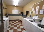 View larger image of Laundry room with checkered floor at DESERT GEM RV RESORT image #7