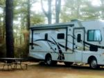 Parked RV at site Sun Retreats Cape Cod - thumbnail