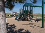 View larger image of The playground equipment at HEARTLAND RV PARK  CABINS image #3