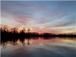 A view of the water at dusk at Tranter's Creek Resort & Campground - thumbnail