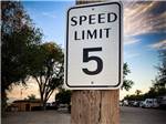 The speed limit sign on a light pole at TRAILER VILLAGE RV PARK - thumbnail
