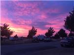 Purple and pink sunset at dusk at CEDAR VALLEY RV PARK - thumbnail