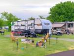 Parked RV's at site Sun Outdoors Association Island - thumbnail