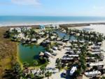 Aerial view of sites and grounds at Gulf Waters Beach Front RV Resort - thumbnail