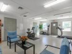 Exercise equipment in the library room at SWAN CREEK COMMUNITY (MHP) - thumbnail