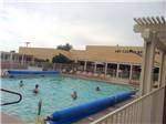 View larger image of People swimming in pool at DEL PUEBLO RV RESORT image #4