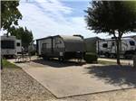 View larger image of One of the gravel RV sites with a picnic bench at NEW LIFE RV PARK image #7