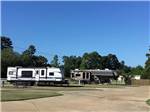 A line of paved RV sites at SHADY PINES RV PARK - thumbnail