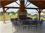 Patio with outdoor seating at BLUEBONNET RIDGE RV PARK & COTTAGES - thumbnail