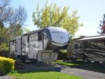 Fifth-wheel parked at site at JACK'S LANDING RV RESORT - thumbnail