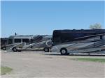 Big rigs on gravel sites at NORTH PARK RV CAMPGROUND - thumbnail