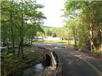 A bridge across a stream at ECHO VALLEY CAMPGROUND - thumbnail