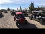A line of side by side ATVs at CEDAR COVE RV PARK - thumbnail