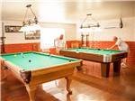 Pool tables in game room at ENCORE CAPRI - thumbnail